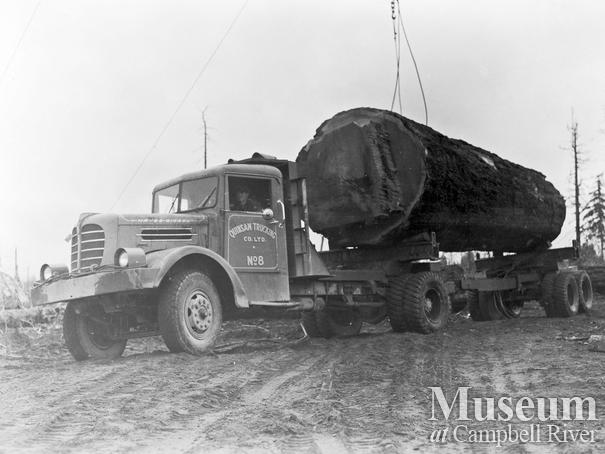 A loaded Quinsam Trucking logging truck